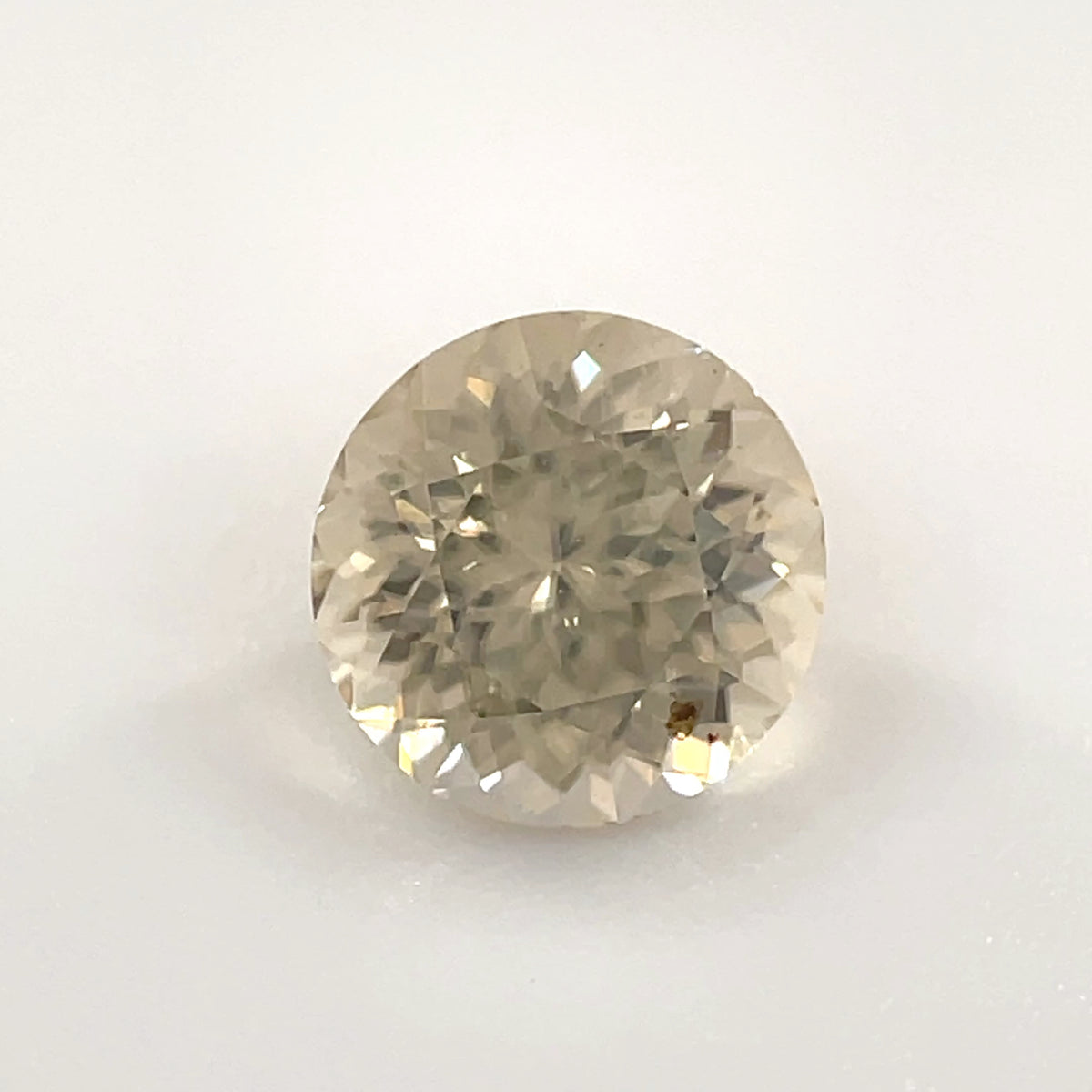 PG-272-1-2 Tanzanian Zircon 6 MM Round 1.3cts