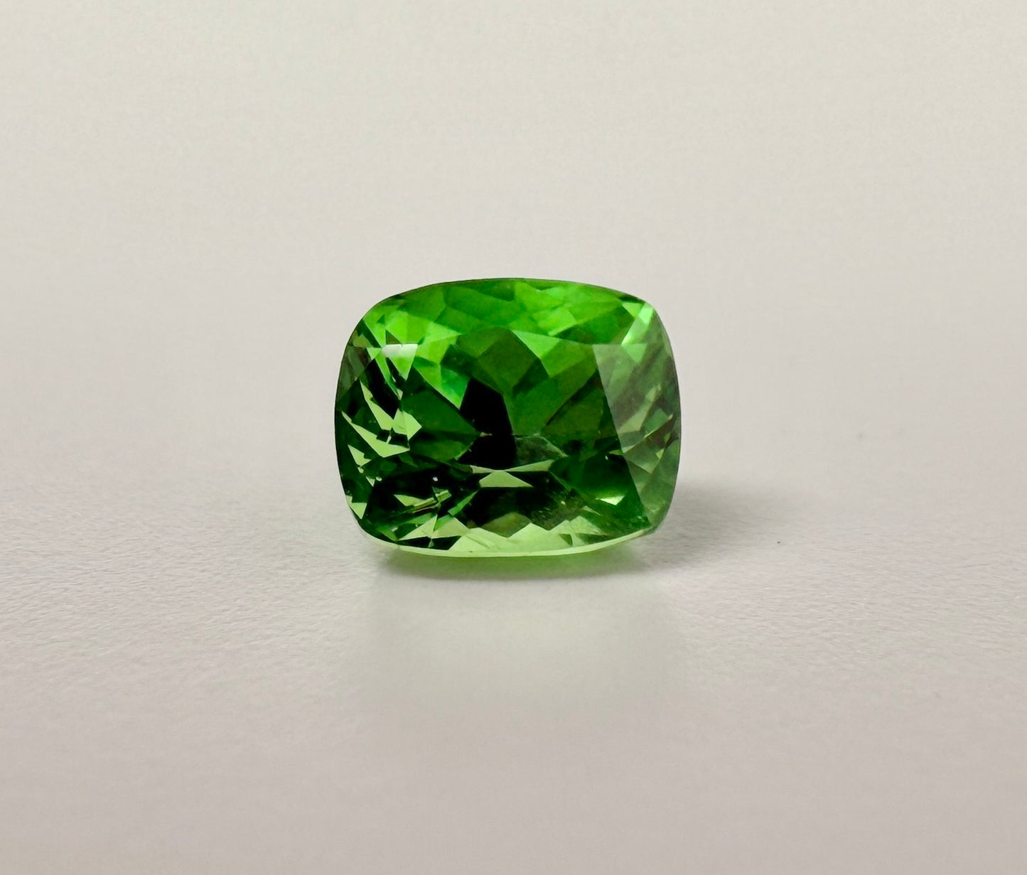 PG-297-50-1 Tsavorite 5.1 x 6.3 MM Cushion 1.42cts