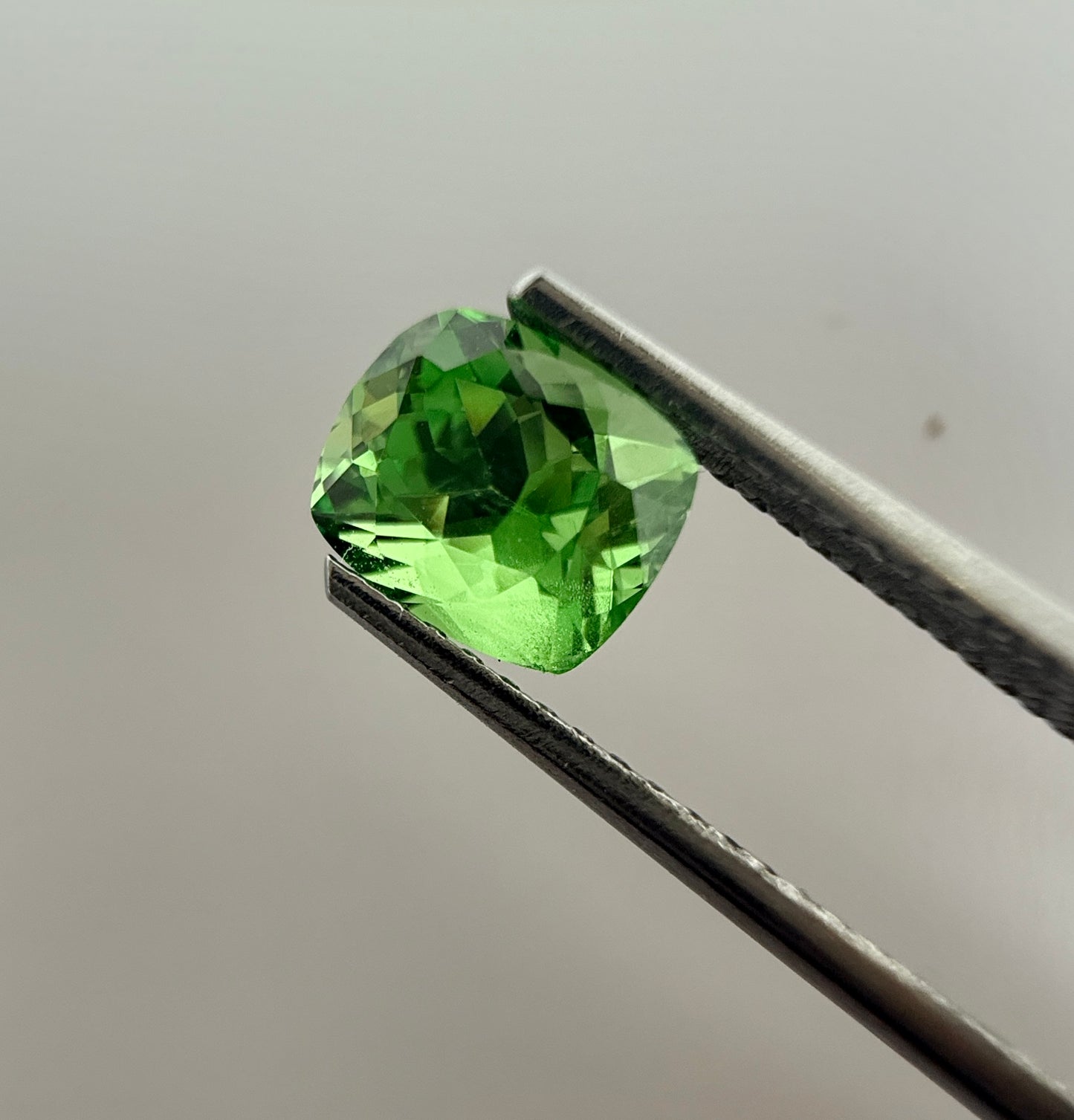 PG-297-50-1 Tsavorite 5.1 x 6.3 MM Cushion 1.42cts