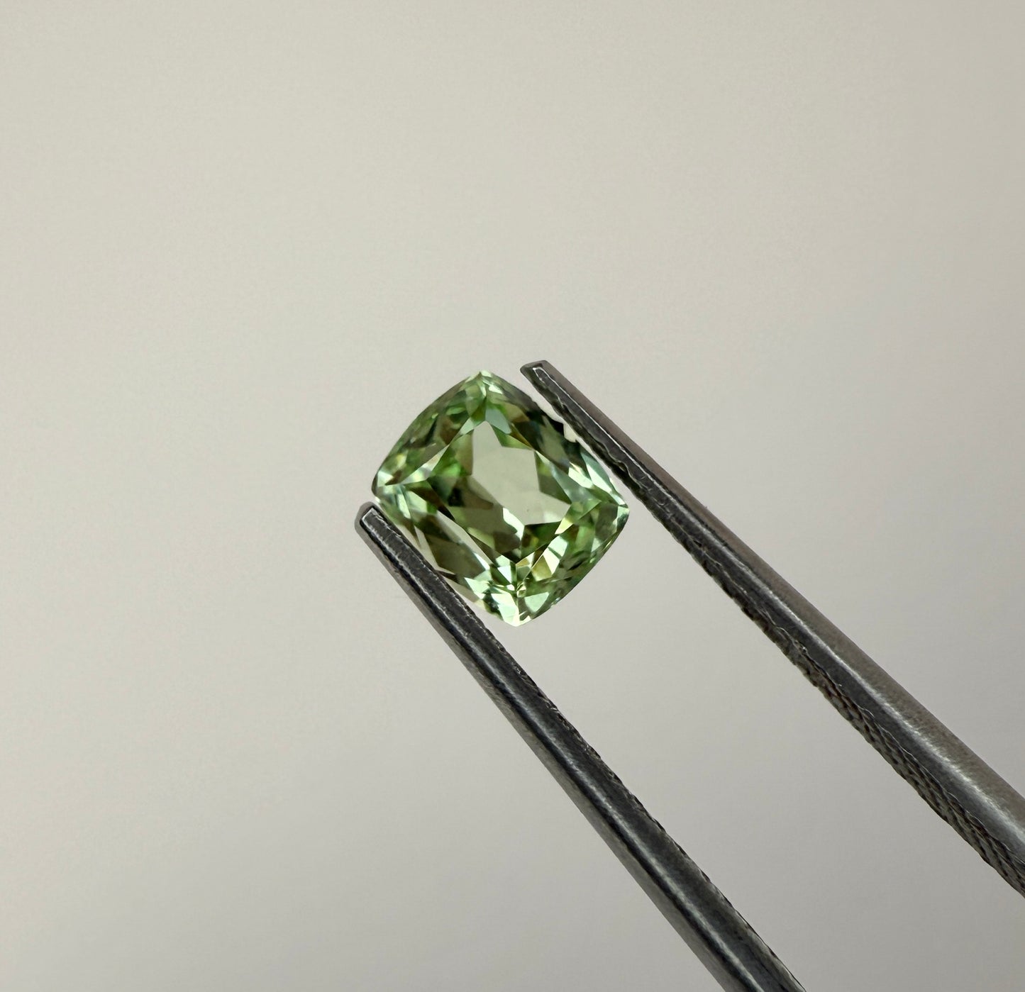 PG-311-76-2 Merelani Mint Garnet 5.5 x 6.4 MM Cushion 1.31cts