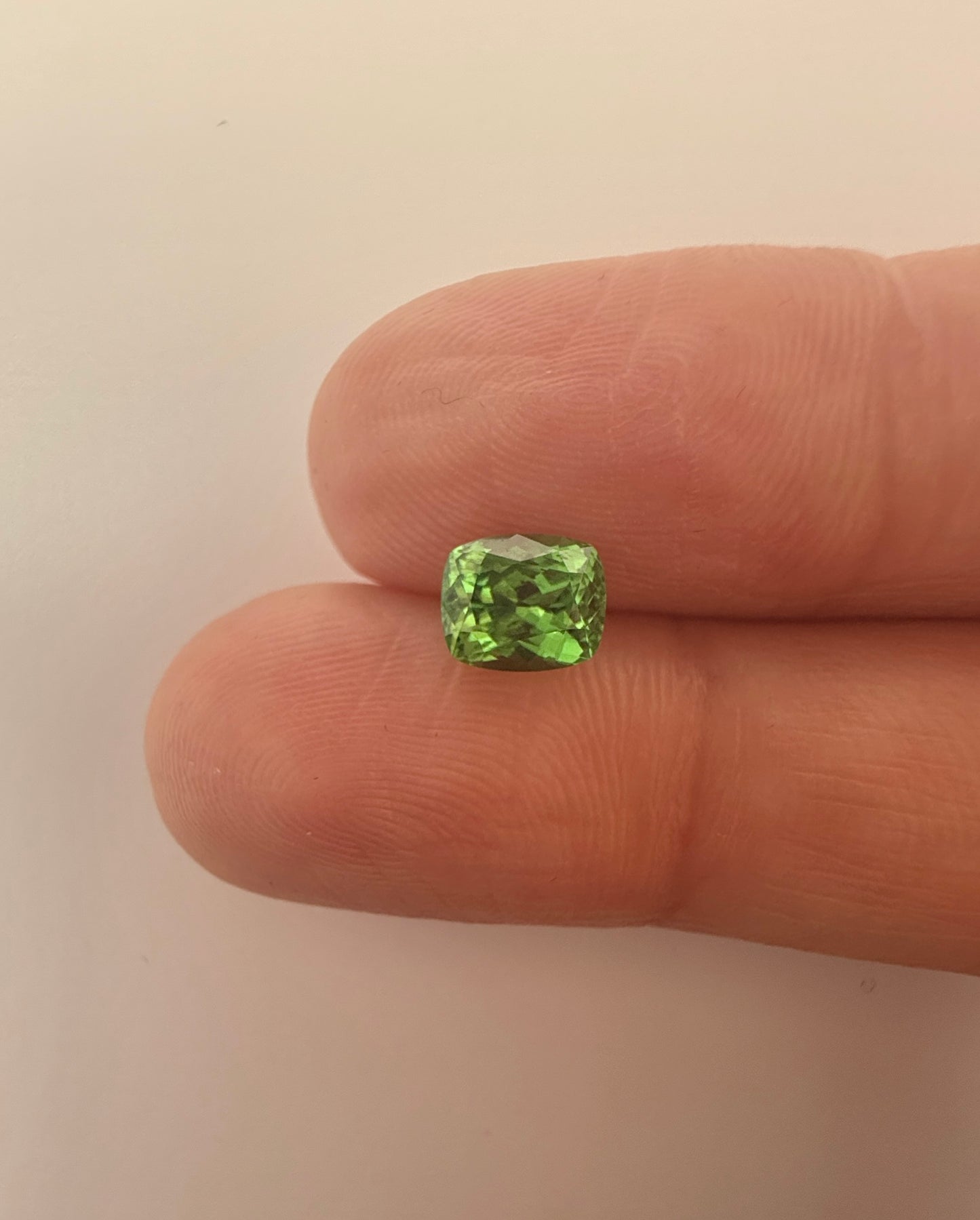 PG-312-61-1 Tsavorite 5.1 x 6.1 MM Cushion 1.06cts