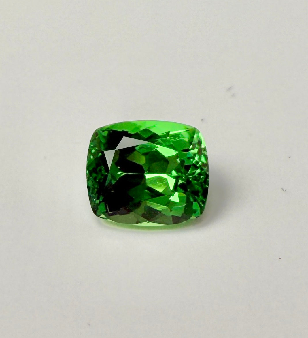 PG-312-96-1 Tsavorite 5.6 x 6.6 MM Cushion 1.34cts