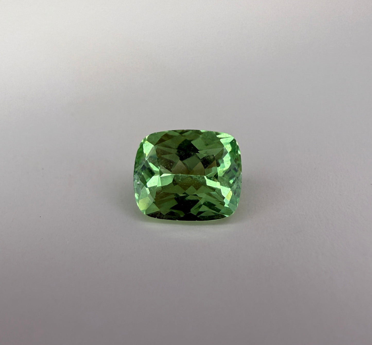 PG-313-111 Merelani Mint Garnet 5.6 x 6.6 MM Cushion 1.12cts