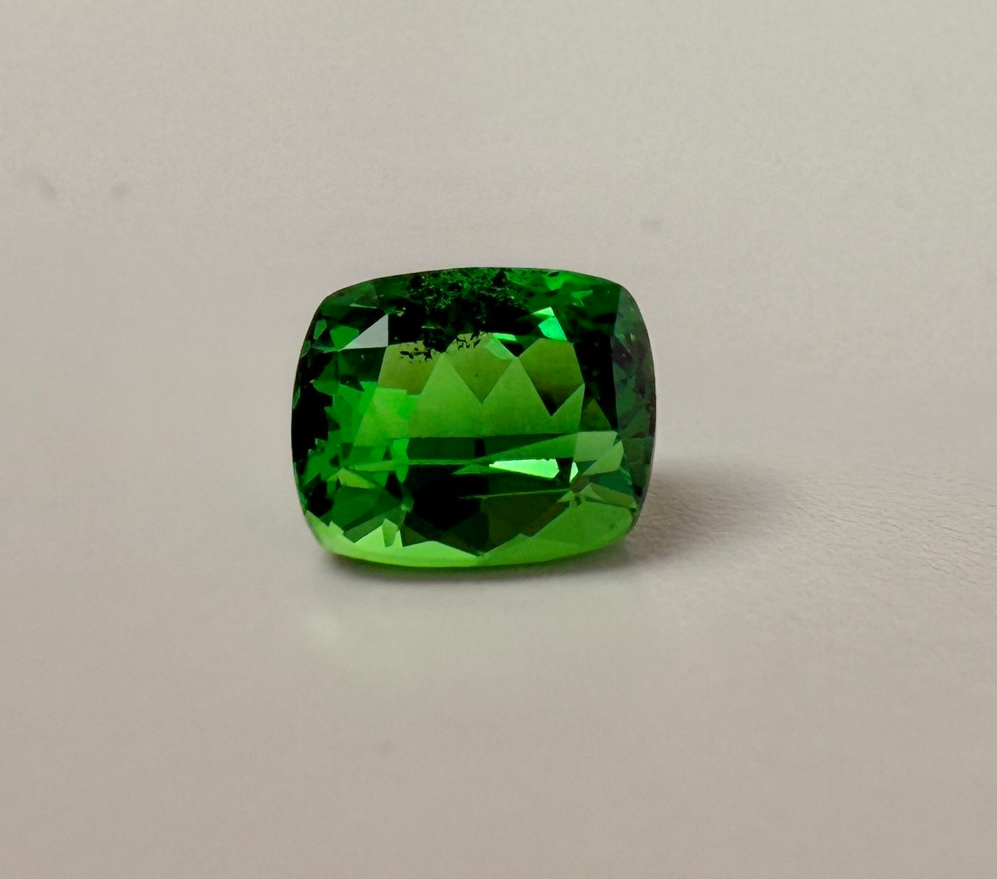 PG-313-26-1 Tsavorite 6.2 x 7.3 MM Cushion 2.02cts
