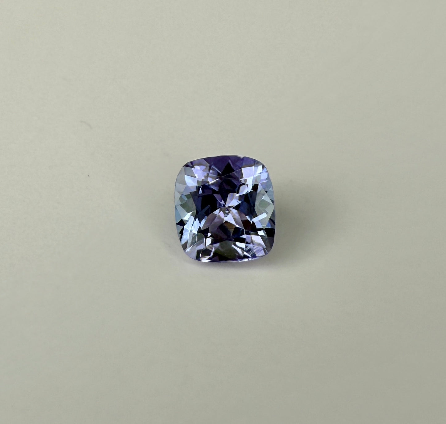 PG-33-8-19 Tanzanite 6.4 MM Cushion 1.39cts
