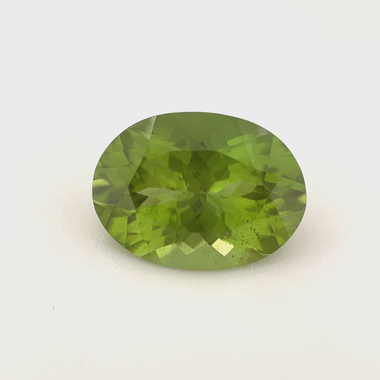 PG-126-19-MJ Burmese Peridot 9.4 x 12.8 MM Oval 4.99cts